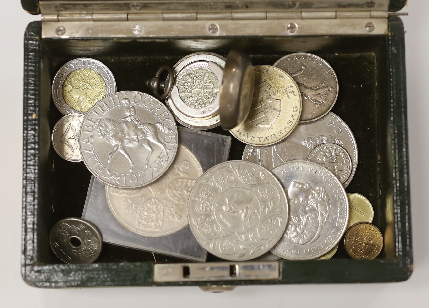 A group of mixed medallions and coins and a silver sovereign case